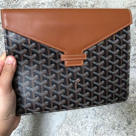 goyard envelope clutch.